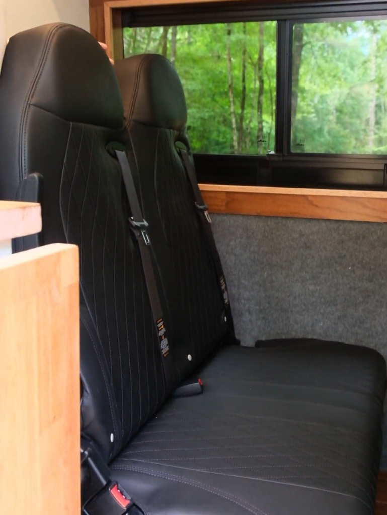 glamp mobile gm2 campervan flip up 2 seat bench with seatbelts forward facing in down position cropped